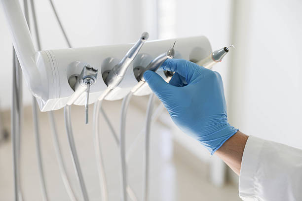 Professional Dental Implants technician working in Coweta, OK
